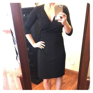 Black long sleeved dress.